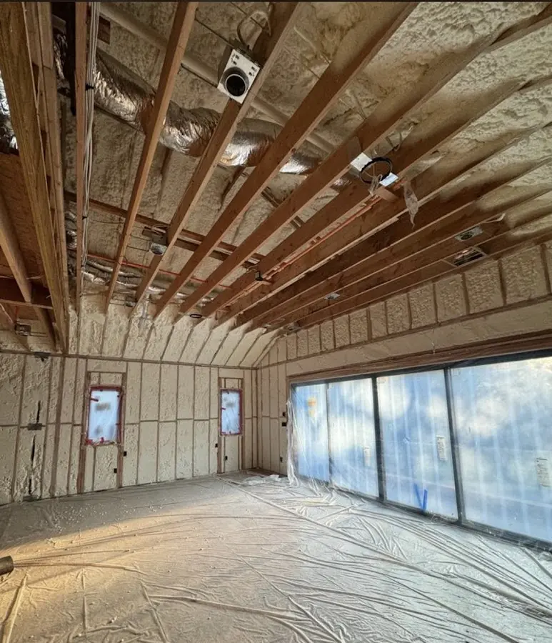Interior walls and ceiling insulated with spray foam during new construction in Clarkston
